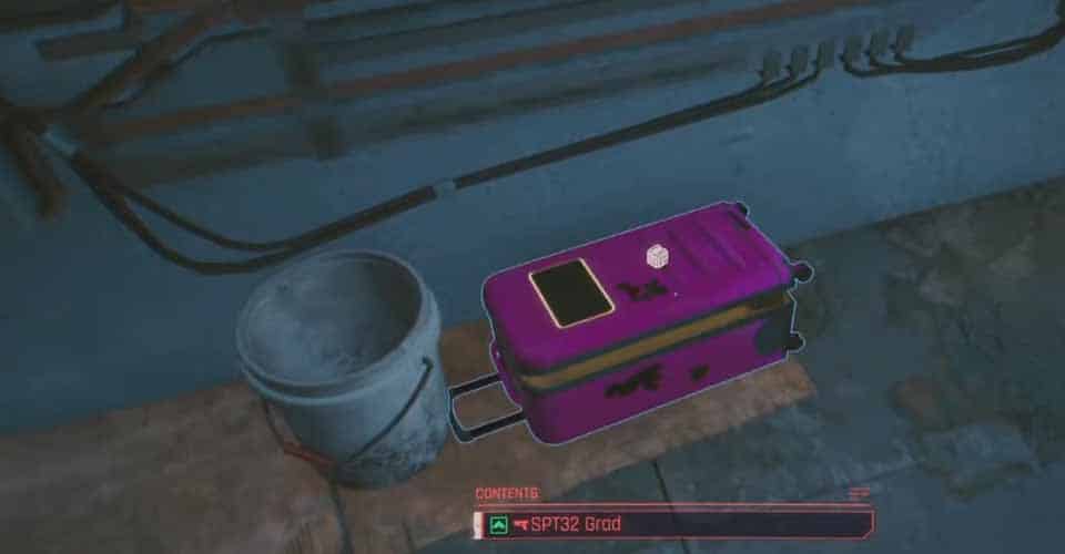 A screenshot showing the pink suitcase where you can find the SPT 32 Grad Sniper Rifle in Cyberpunk 2077