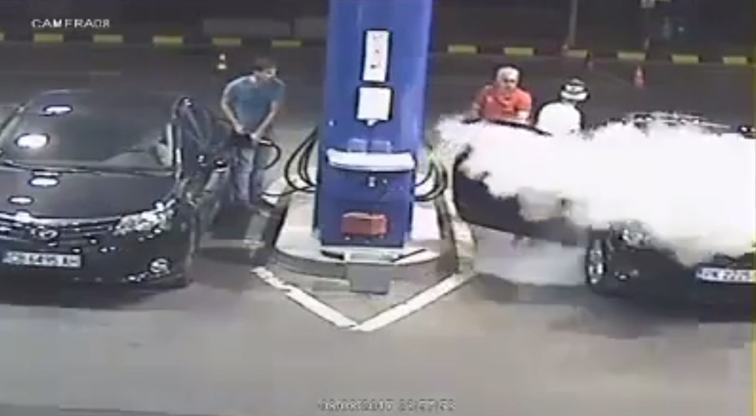 Man at gas station has his cigarette put out in the best way possible