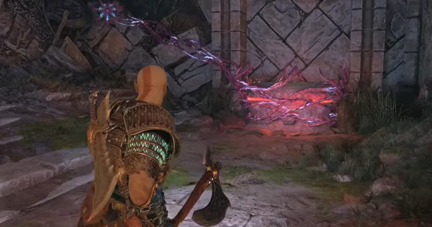 A screenshot of the vines destroyed covering a chest in God of War: Ragnarok