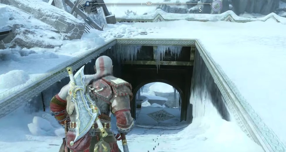 A screenshot of Kratos approaching the entrance to the location of Thor's Frozen Thunderbolt in God of War: Ragnarok