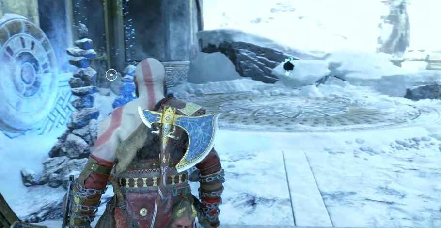 A screenshot of Kratos approaching a Midgard Rift in God of War: Ragnarok