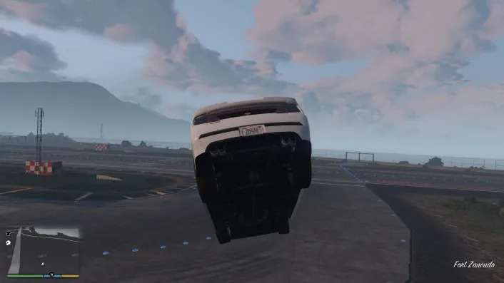 Drive over the ramp and enter the military base to get a jet in GTA V. 