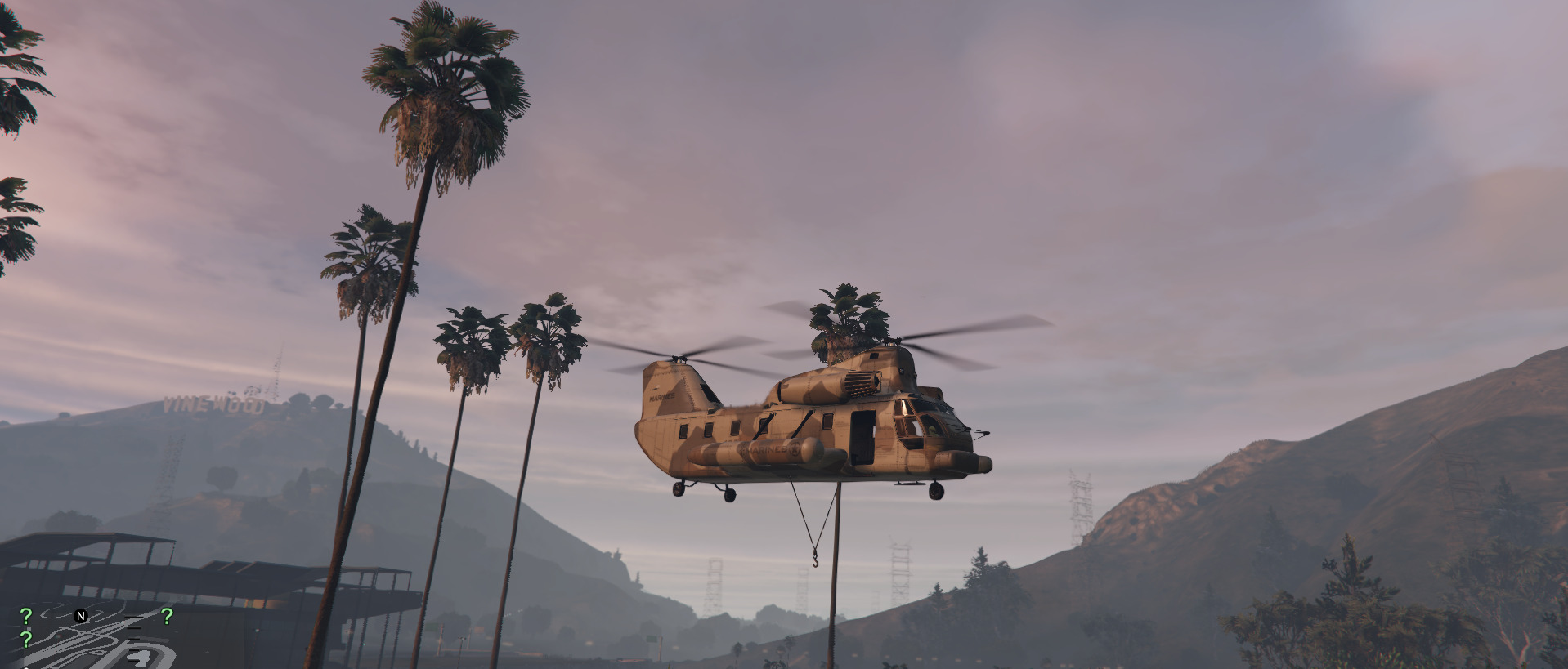 A screenshot showing the Cargobob flying in GTA 5