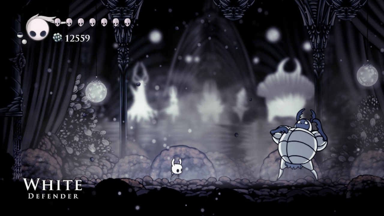 A screenshot showing the White Defender boss in Hollow Knight