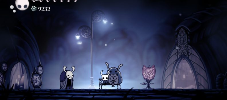 A screenshot of the Knight sitting on a Bench in Dirtmouth.