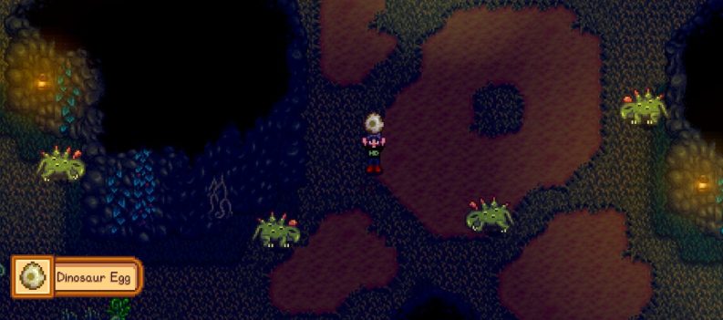 An image of the player holding up a dinosaur egg in Skull Caverns.