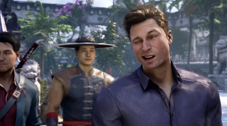 A screenshot of Johnny Cage winking to someone off camera in Mortal Kombat 1
