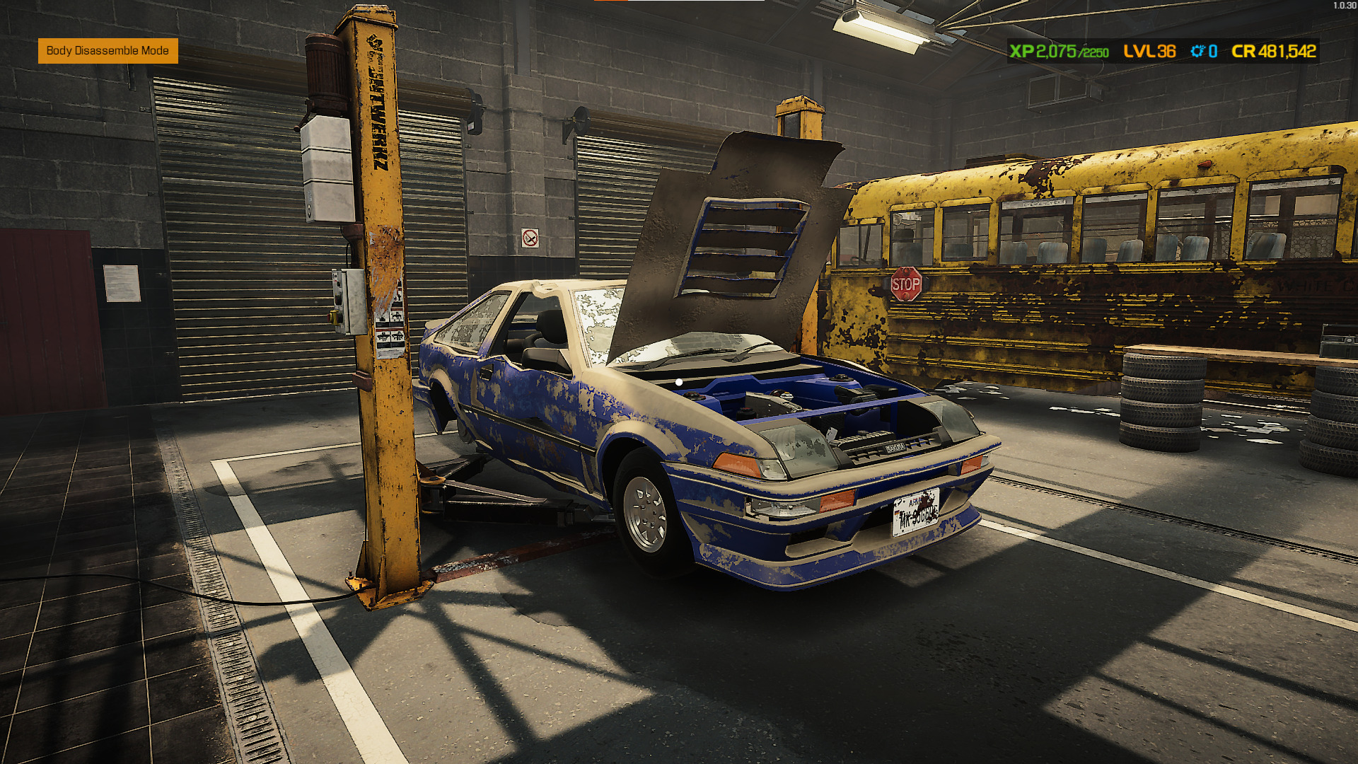 A screenshot showing how to place a car on the lift in Car Mechanic Simulator
