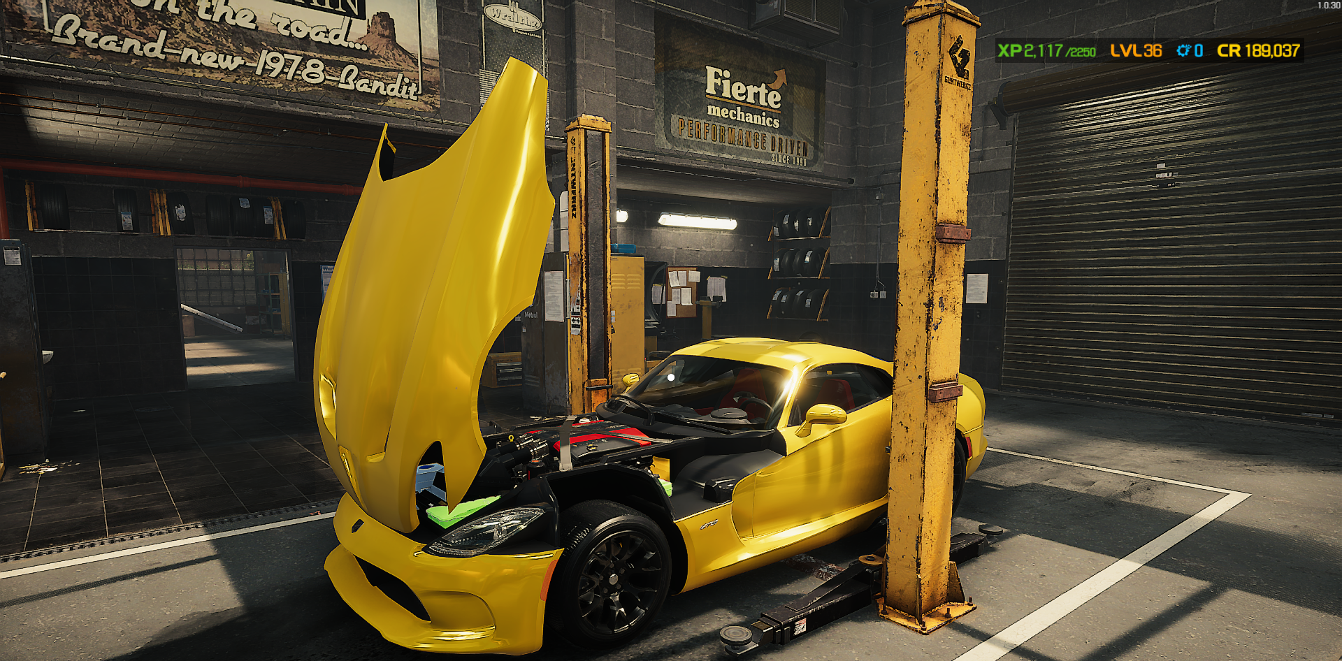 Screenshot of a Dodge Viper with its hood open on the lift. 