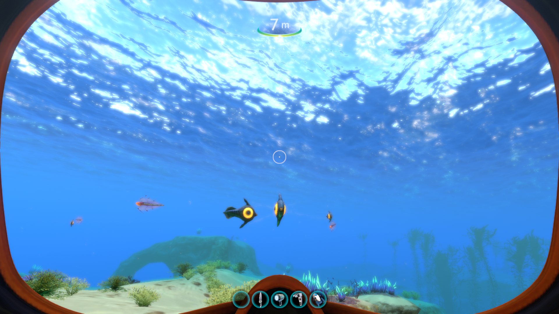 A screenshot of several Peeper fish swimming about in Subnautica