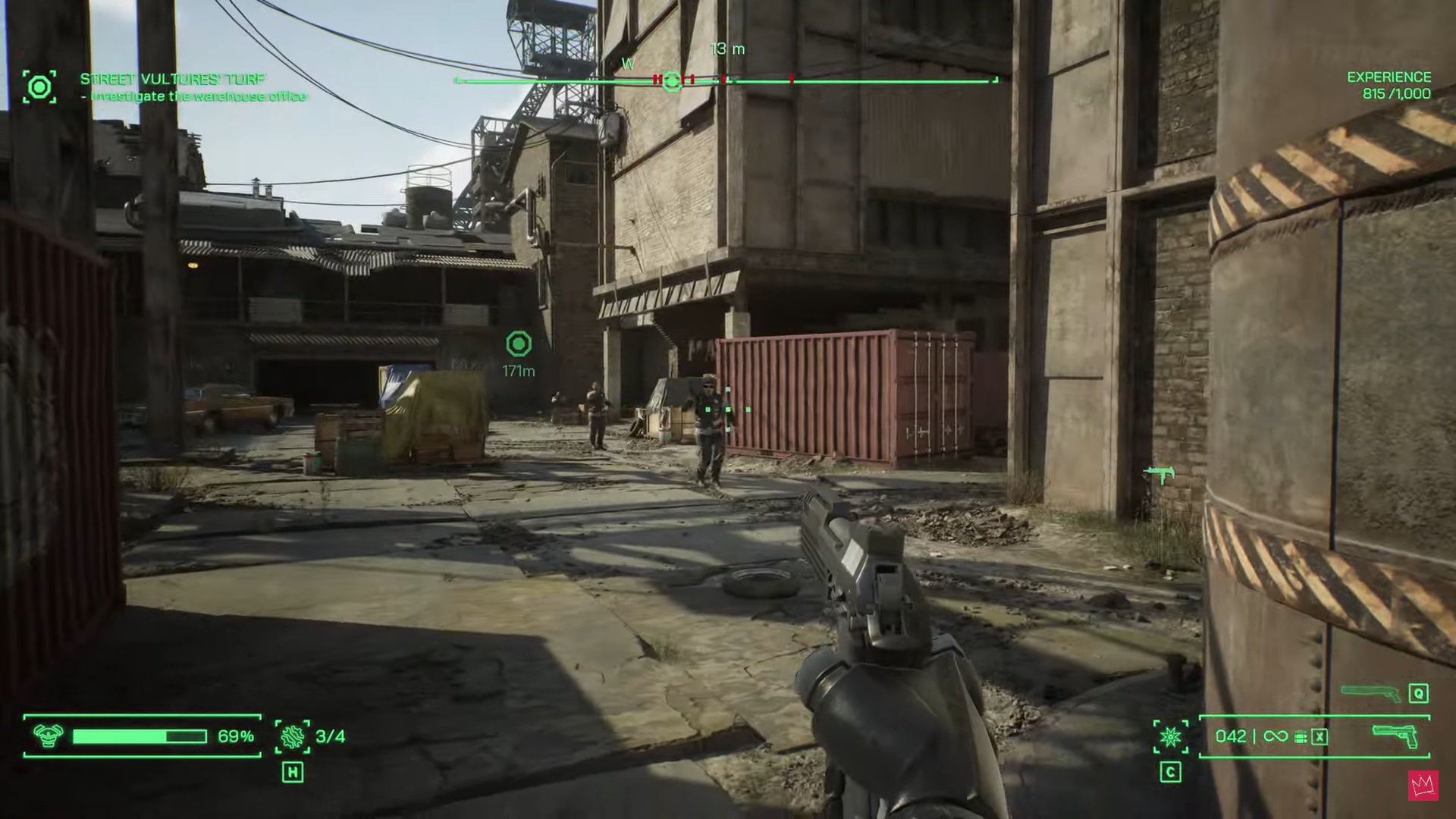A screenshot of RoboCop firing at thugs.